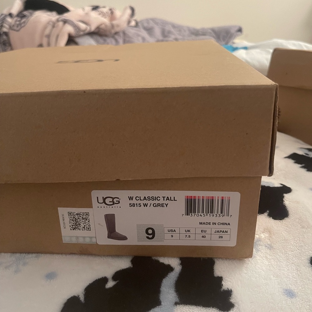 Brand new Ugg classic gray boots in size 9 never worn